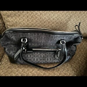 Coach Elegant Black Patterned Women's purse.
Excellent condition!